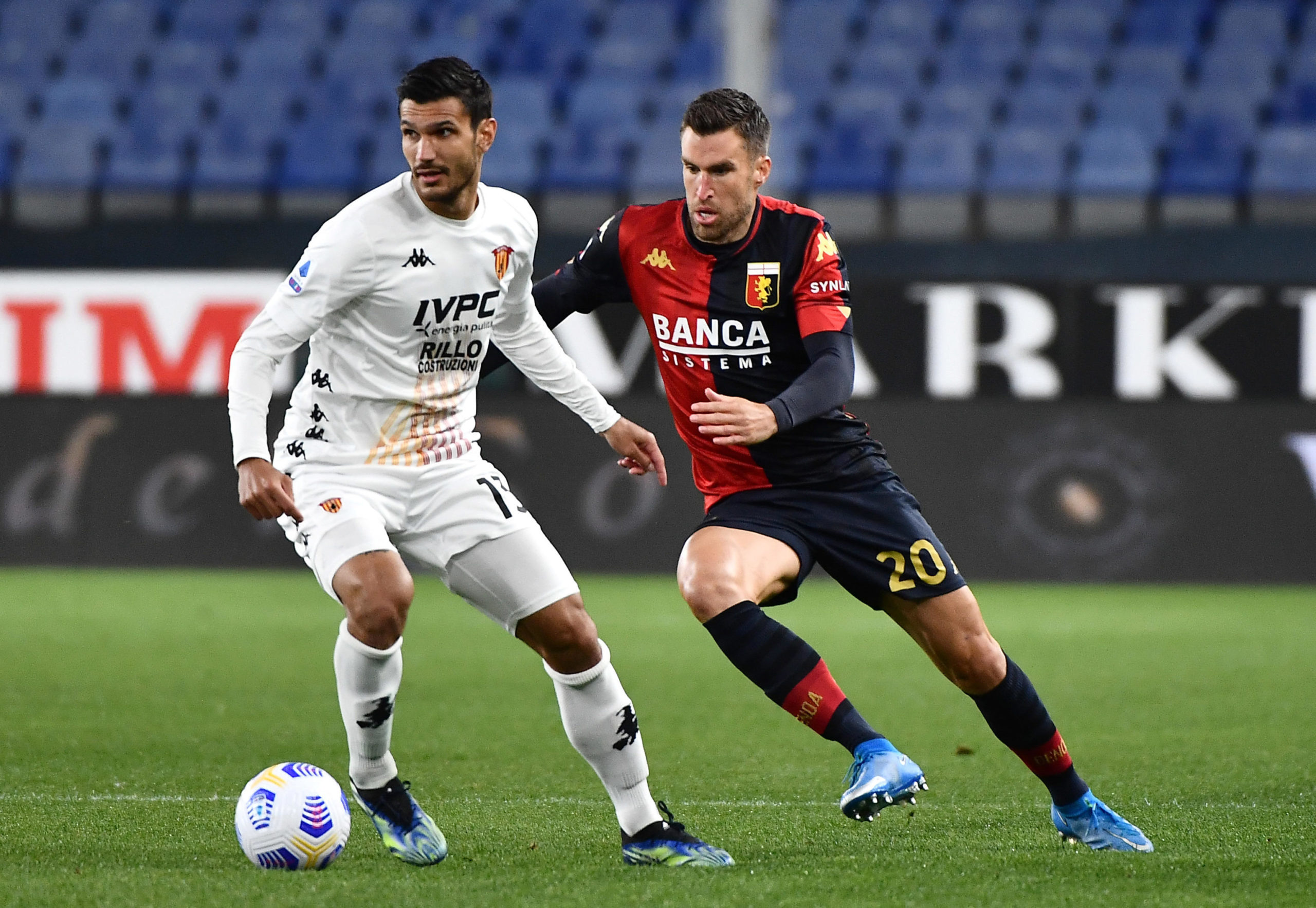 Genoa's Kevin Strootman presses Benevento's Alessandro Tuia