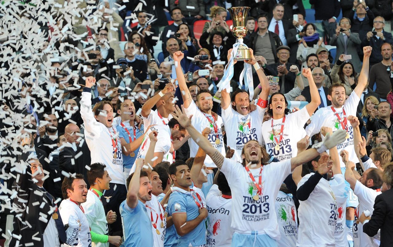 Lazio players celebrate with trophy after winning the 2013 Coppa Italia Final against Roma