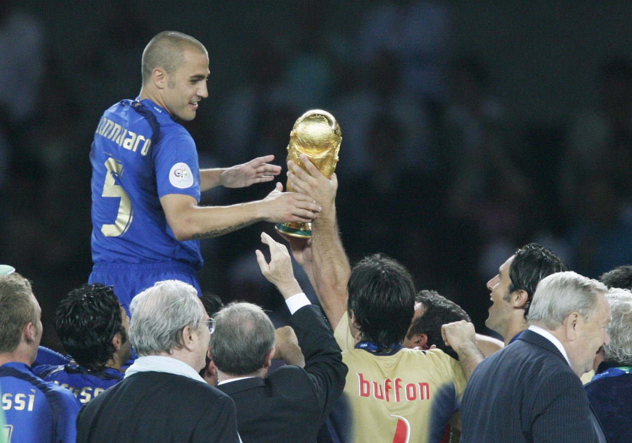 Fabio Cannavaro takes the World Cup during the ceremony after the final of the 2006 FIFA World Cup between Italy and France at the Olympic Stadium in Berlin.