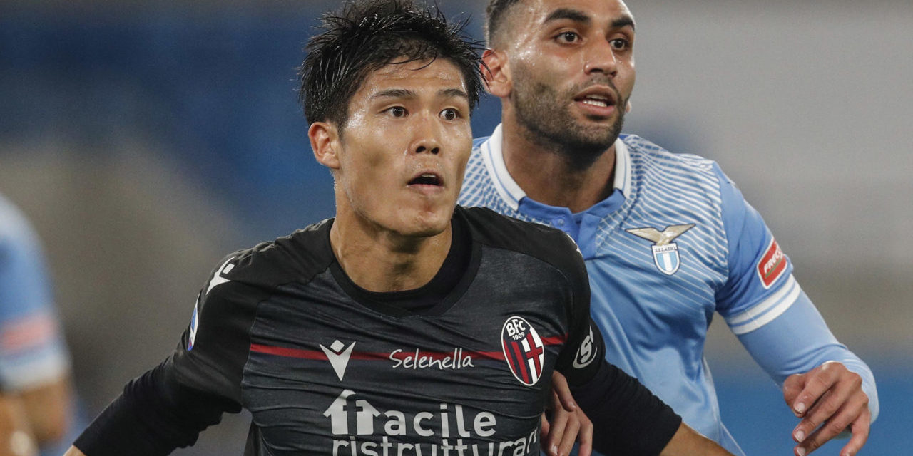 epa08771424 Bologna's Takehiro Tomiyasu (L) and Lazio's Mohamed Fares (R) in action during the Italian Serie A soccer match between SS Lazio and Bologna FC at the Olimpico stadium in Rome, Italy, 24 October 2020. EPA-EFE/GIUSEPPE LAMI