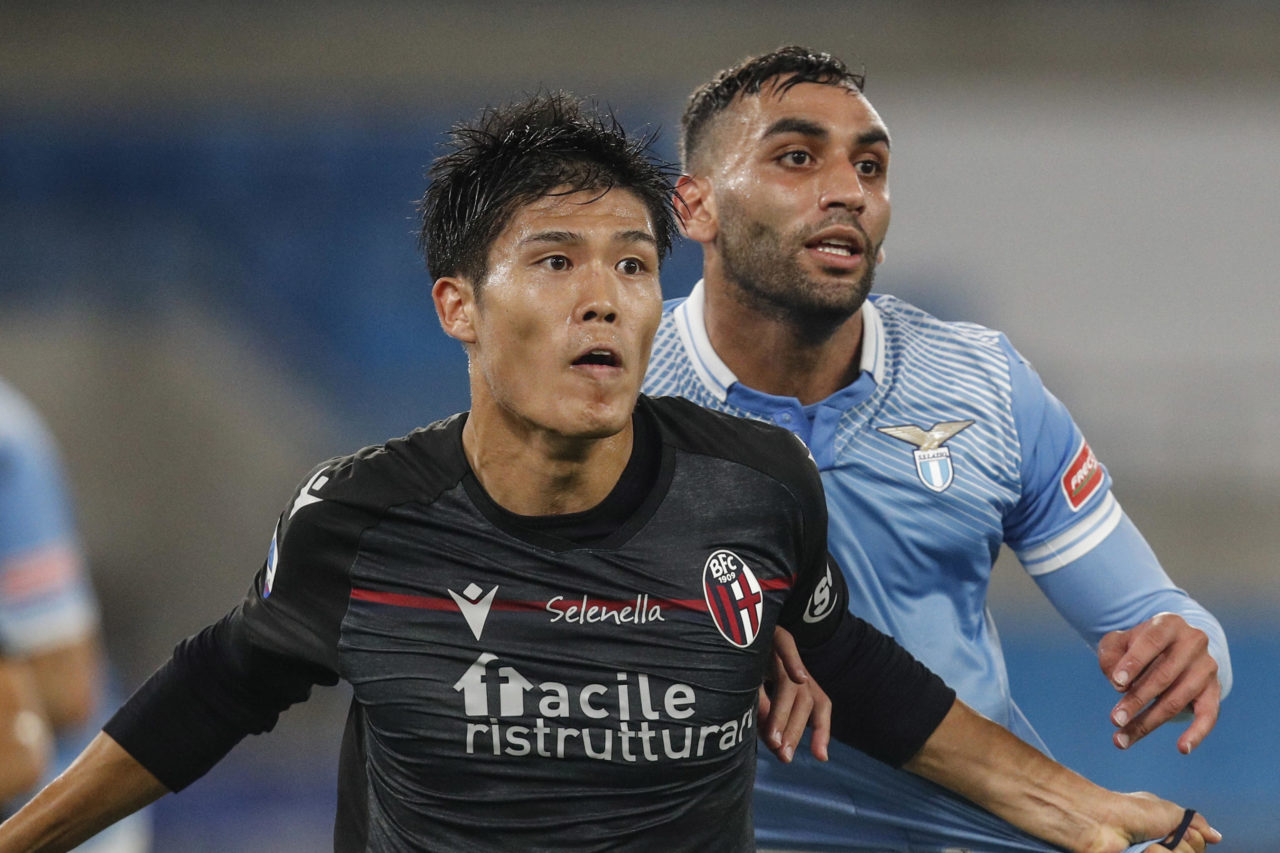 epa08771424 Bologna's Takehiro Tomiyasu (L) and Lazio's Mohamed Fares (R) in action during the Italian Serie A soccer match between SS Lazio and Bologna FC at the Olimpico stadium in Rome, Italy, 24 October 2020. EPA-EFE/GIUSEPPE LAMI