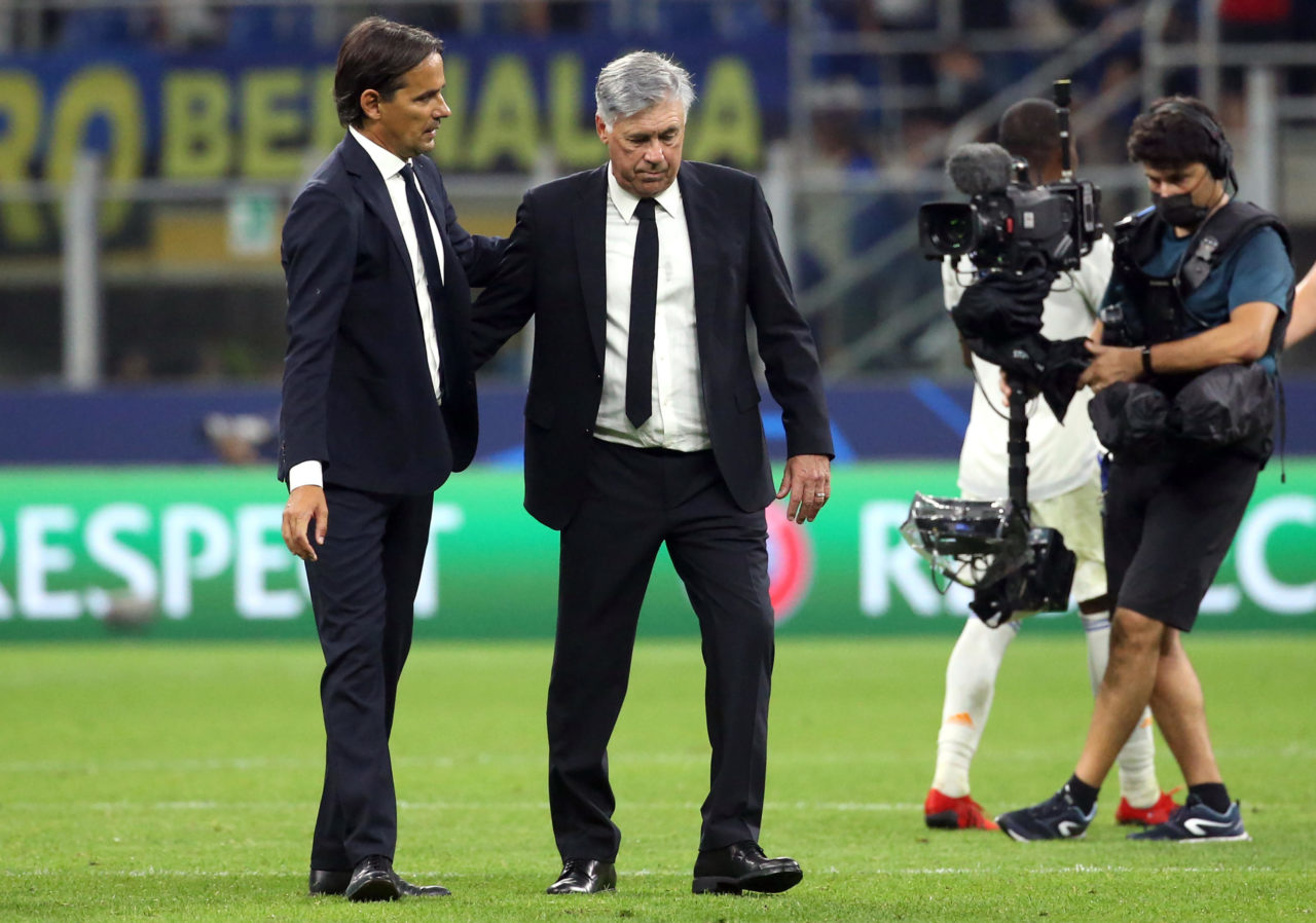 epa09470692 Inter Milan?s coach Simone Inzaghi (L) and Real Madrid's coach Carlo Ancelotti during the UEFA Champions League group D soccer match between FC Inter and Real Madrid at Giuseppe Meazza stadium in Milan, Italy, 15 September 2021. EPA-EFE/MATTEO BAZZI