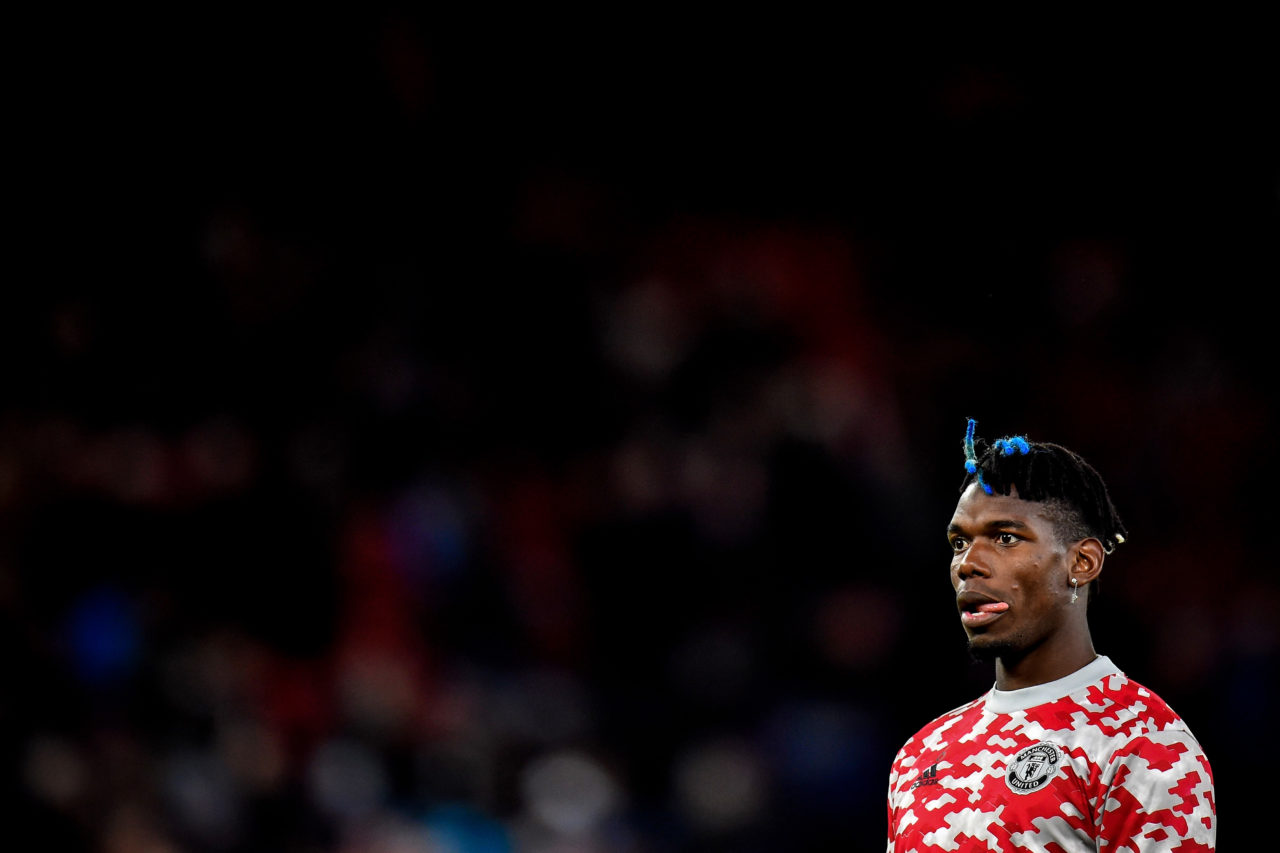 epa09534798 Manchester United's Paul Pogba reacts as he warms up prior to the UEFA Champions League group F soccer match between Manchester United and Atalanta BC in Manchester, Britain, 20 October 2021. EPA-EFE/Peter Powell