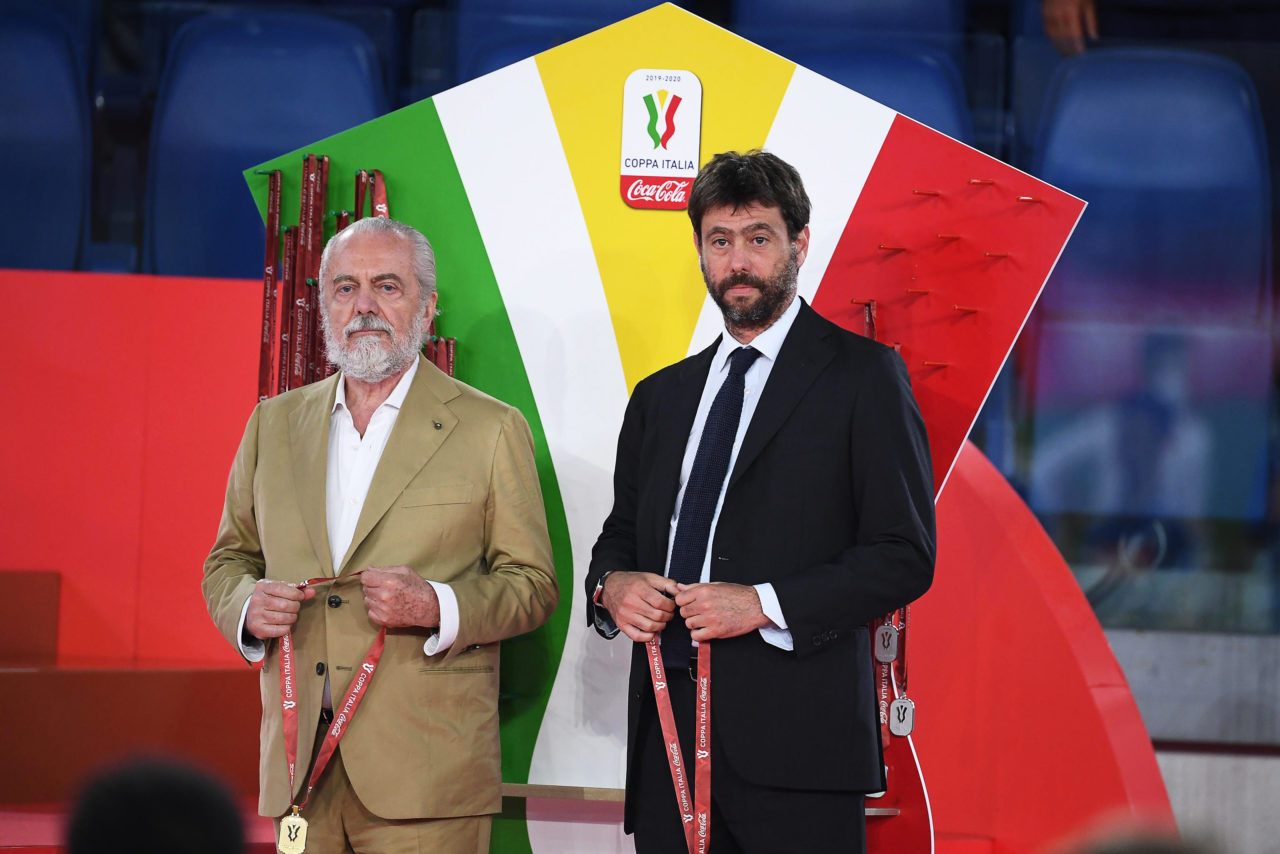 epa08492368 Napoli's president Aurelio De Laurentiis (L) and Juventus' president Andrea Agnelli (R) stand on the podium after the Italian Cup final soccer match between SSC Napoli and Juventus FC at the Olimpico stadium in Rome, Italy, 17 June 2020. Napoli won 4-2 on penalties. EPA-EFE/ETTORE FERRARI