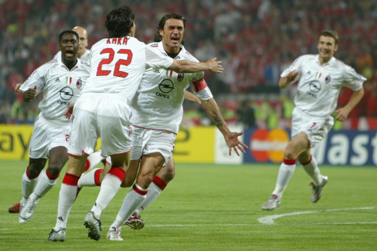 epa000442539 AC Milan captain Paolo Maldini (C) celebrates with his team mates (L-R) Clarence Seedorf, Kaka and Andriy Shevchenko after scoring his team's mfirst goal against Liverpool FC during their UEFA Champions League football final match in the Ataturk Olympic Stadium in Istanbul, Wednesday 25 May 2005. AC Milan faces Liverpool FC in the 50th European Champion Club's Cup final. EPA/KERIM OKTEN